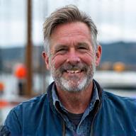 Portrait of David 'Dave' Miller, a rugged and knowledgeable deep-sea fishing expert.